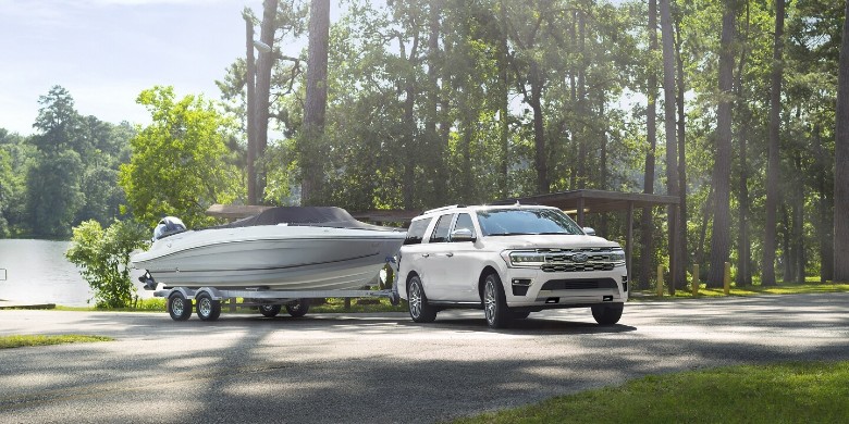 Front exterior view of the 2024 Ford Expedition Max on an open road.