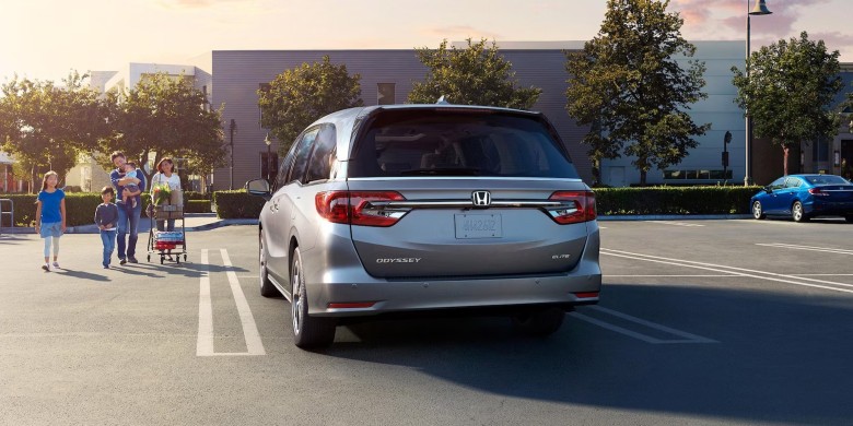 Rear exterior view with hatch open on the 2024 Honda odyssey