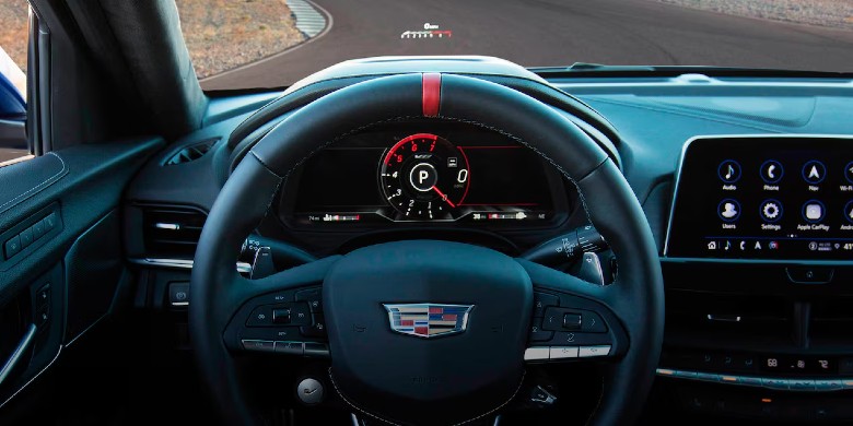 Interior view of technology, steering wheel and dashboard in the 2026 Cadillac ct4v for sale in Tempe, AZ
