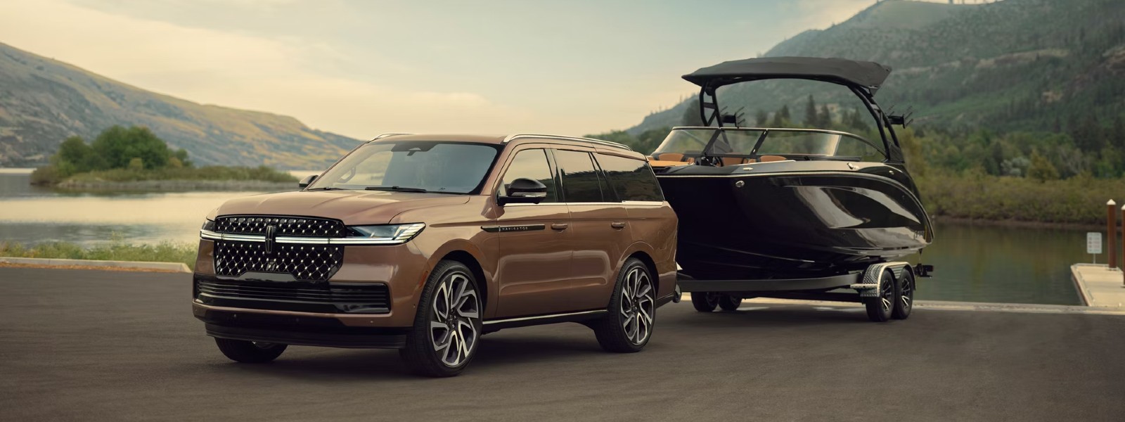 Lincoln Navigator full size luxury SUV driving through landscape