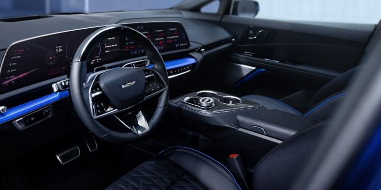 Interior view of technology, steering wheel and dashboard in the 2026 Cadillac optiqv for sale in Tempe, AZ