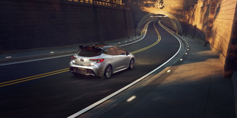 2027 Toyota Corolla Hatchback driving near South Bend IN