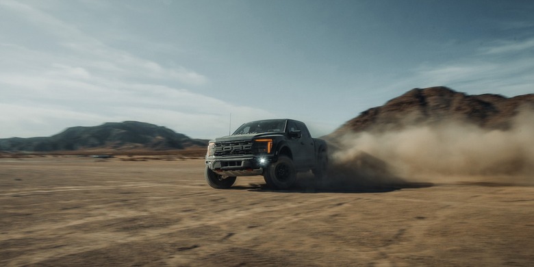 2027 Ford F-150 Raptor desert distance dust