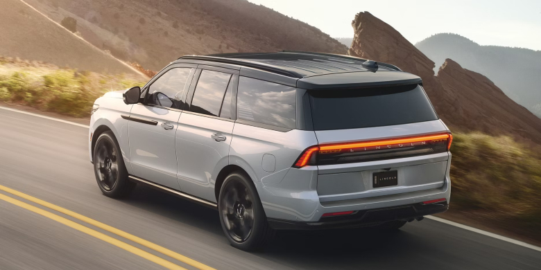 Lincoln Navigator on the road, high mileage used car guide