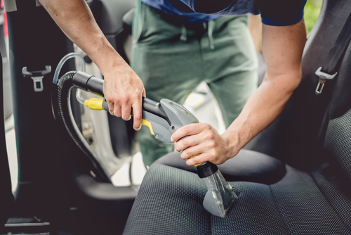 interior of car being vacuumed in tempe, az