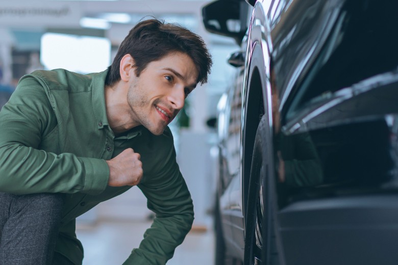 Tire tread inspection on a used car near Carrollton GA