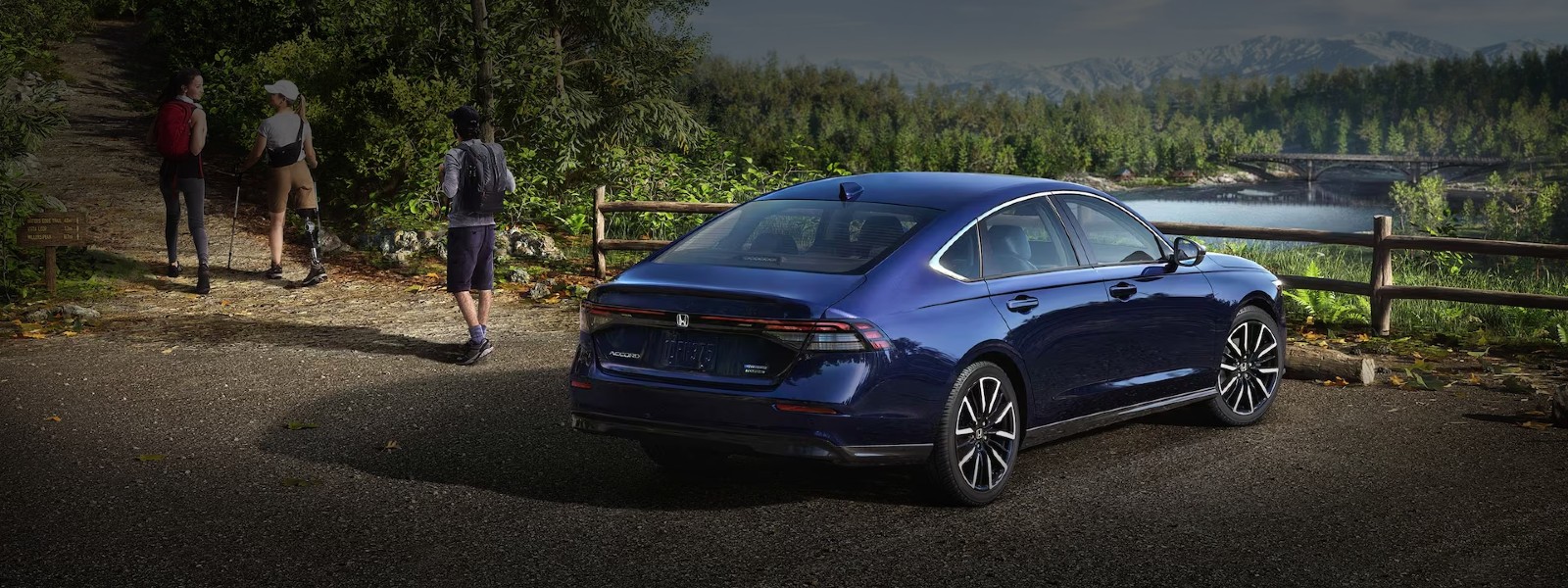 Touring Hybrid shown in Canyon River Blue Metallic.