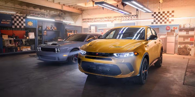 Dodge Hornet in garage with Dodge Charger