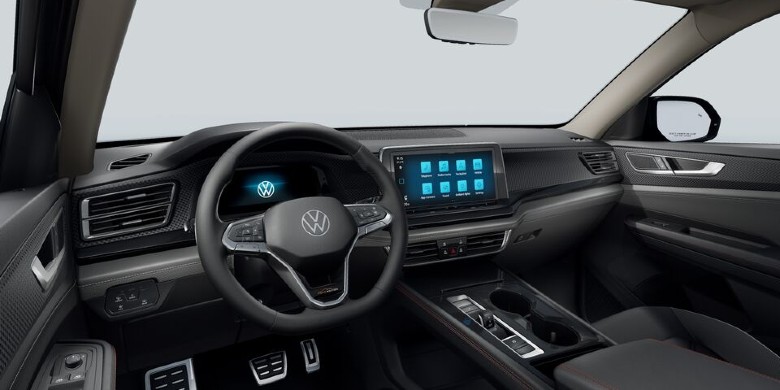 View of interior tech, infotainment system, steering wheel and dashboard in the 2026 Volkswagen Atlas Peak Edition for sale in Racine, WI