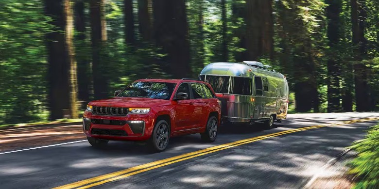 2027 Jeep Grand Cherokee towing an Airstream trailer near Corsicana TX