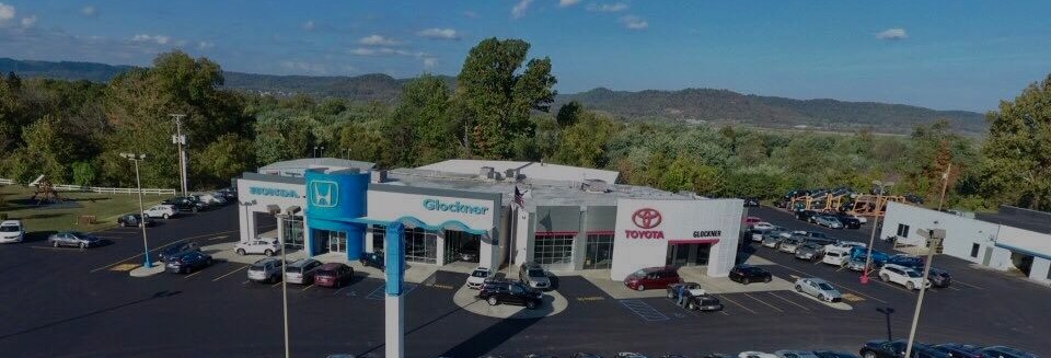 Glockner Honda and Glockner Toyota dealerships at sunset