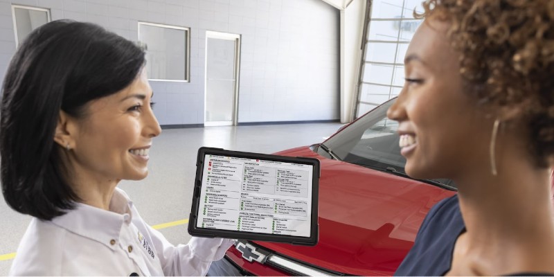 Chevy technician performing an inspection