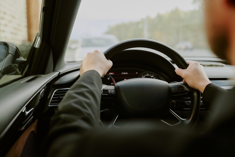 woman looking at used cars