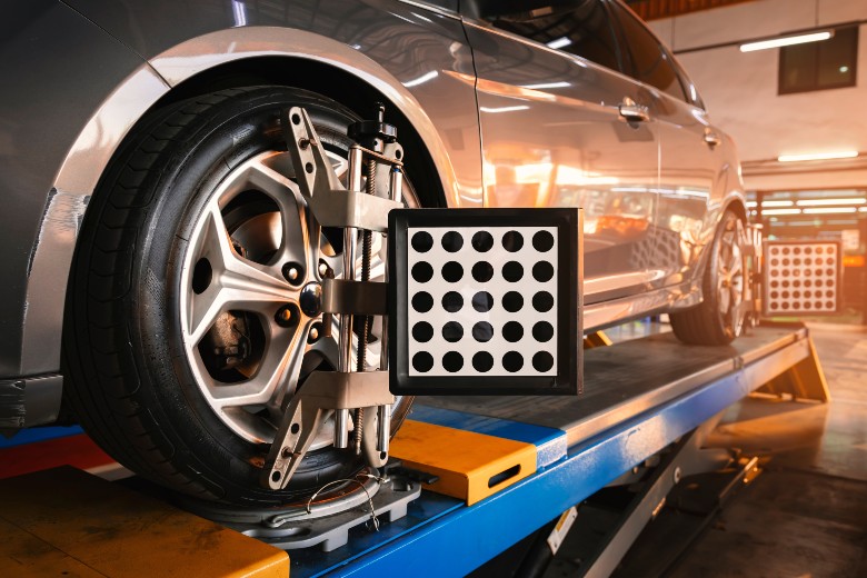 Wheel alignment service on a Chevy