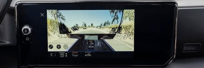trailer view of the 2024 GMC Sierra HD Denali Ultimate for sale in tempe, AZ towing a large trailer