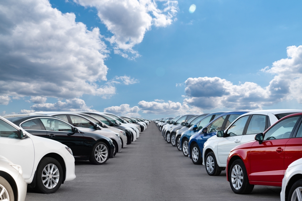 Row of used vehicles on a dealership lot