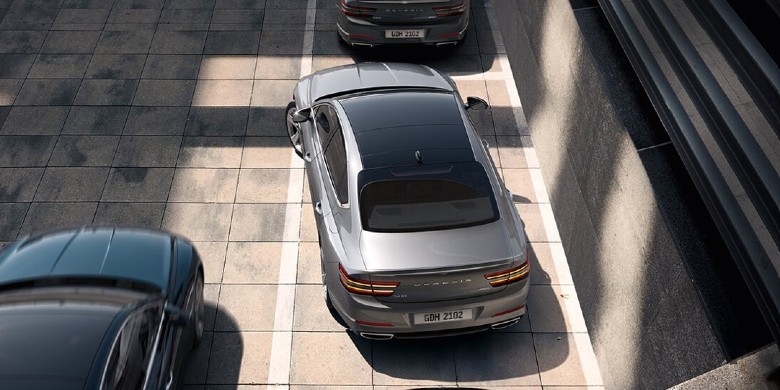 new genesis model using genesis smart park assist technology to park