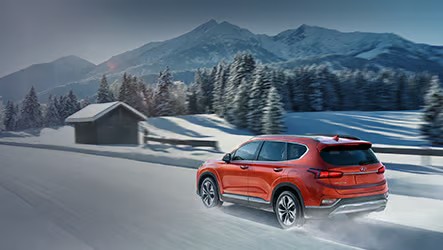 Hyundai SUV starting up on a snowy winter morning in Waukesha, Wisconsin