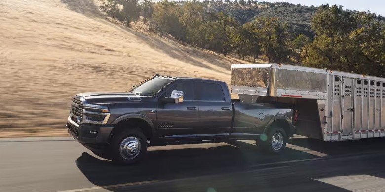 RAM 3500 towing a livestock trailer near Corsicana TX | Brinson CDJR
