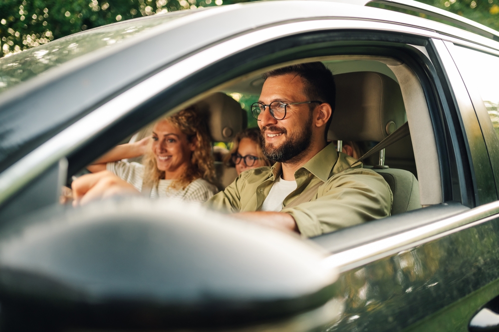 Family test driving a car in tempe, AZ